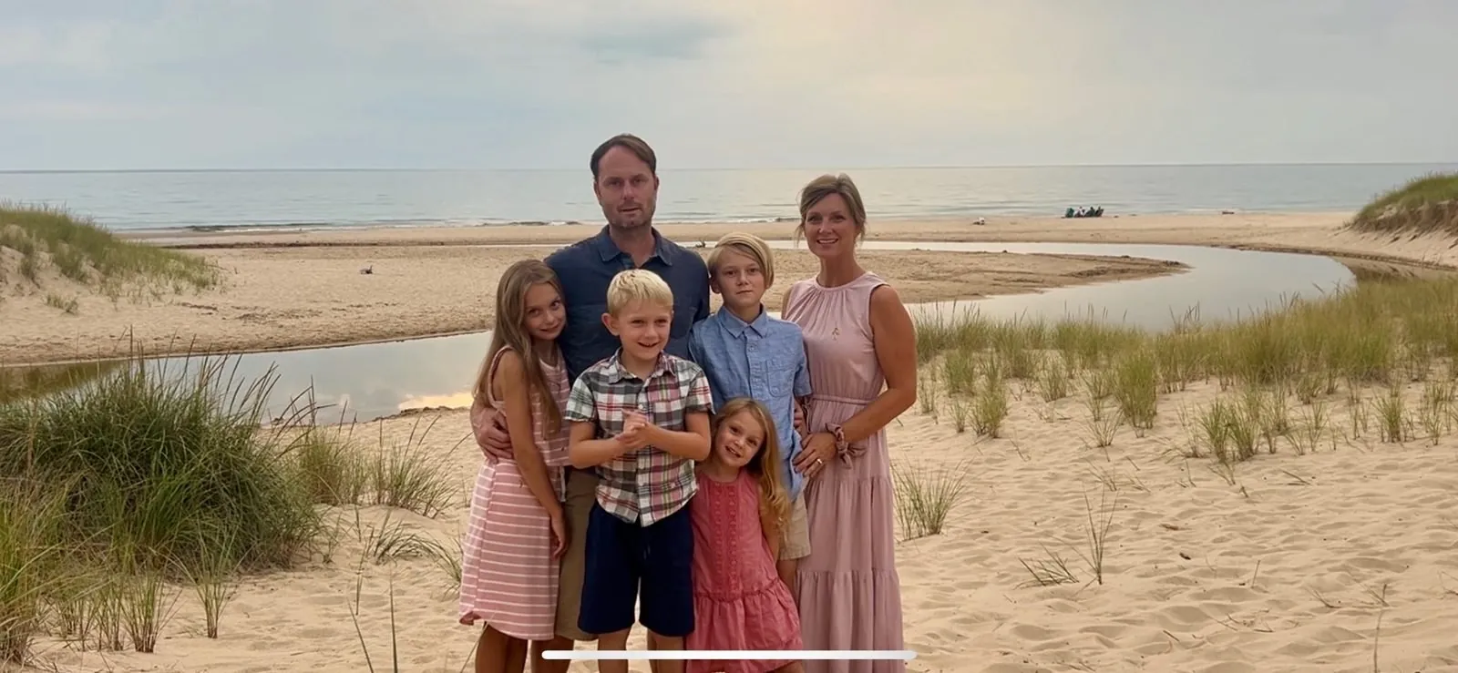 Family of campers on the Lake Michigan beach