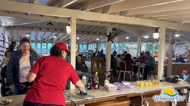 Volunteers serving the Halloween weekend pancake breakfast in the Lodge
