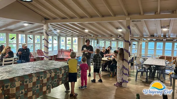 Kids gathering in the Lodge for the Halloween costume and decorating awards