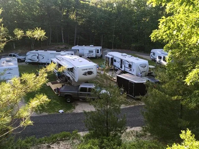Aerial view of RVs parked along a campground road